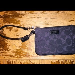 Coach Wrist wallet/clutch. Never been used.